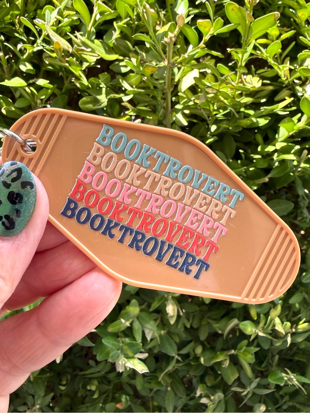 Vintage style motel key keychain humorous book-themed gift idea